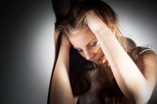 Ilustrasi perempuan merasa stres dan depresi (Shutterstock)