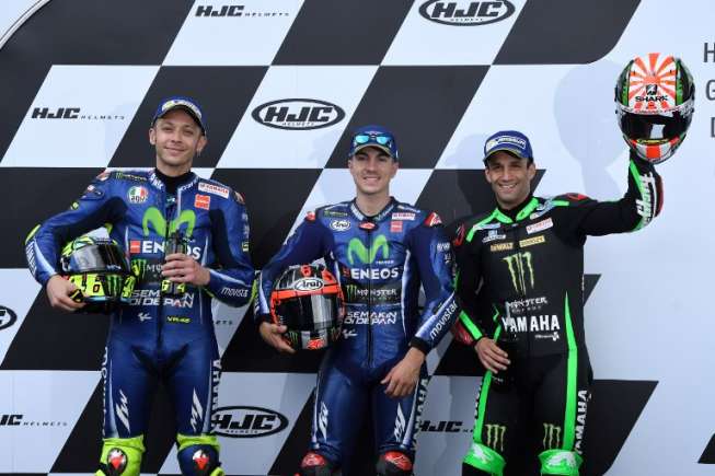 Trio pebalap Yamaha, Valentino Rossi (Movistar Yamaha), Maverick Vinales (Movistar Yamaha), dan Johann Zarco (Monster Tech 3 Yamaha). [AFP/Jean-Francois Monier]