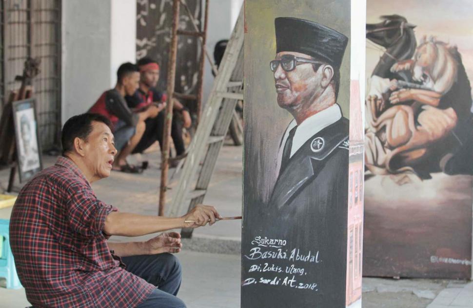 Seniman Mural Percantik Wajah Kota Tua Seniman Mural Percantik Wajah Kota Tua