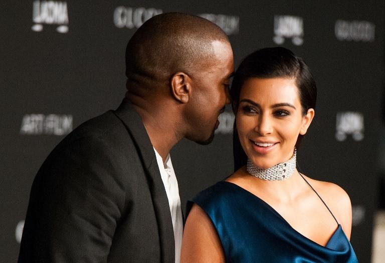 Kim Kardashian dan Kanye West (Valerie Macon / AFP)