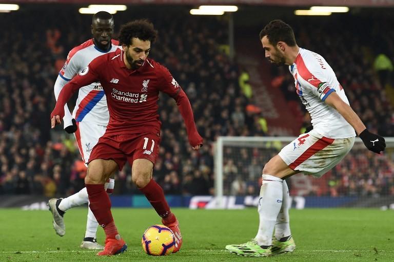 Winger Liverpool, Mohamed Salah (kiri). [Paul ELLIS / AFP]