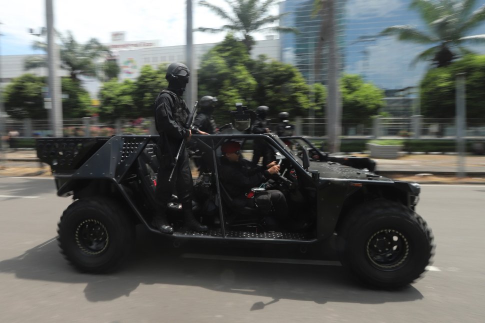 Prajurit SAT-81 Gultor Kopassus saat parade Pemberangkatan Patroli Skala Besar TNI-Polri di JIExpo, Kemayoran, Jakarta Pusat, Minggu (14/4). [Suara.com/Muhaimin A Untung}