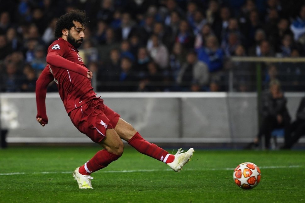 Striker Liverpool, Mohamed Salah, mencetak gol ke gawang Porto di leg kedua perempat final Liga Champions, Kamis dini hari waktu Indonesia (18/4/2019). [AFP/Paul Ellis]