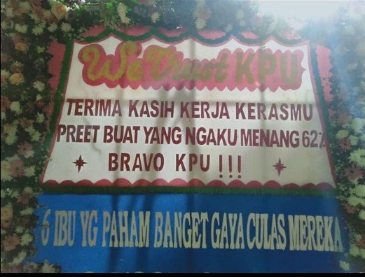 Karangan bunga berpesan unik di Kantor KPU (Facebook)