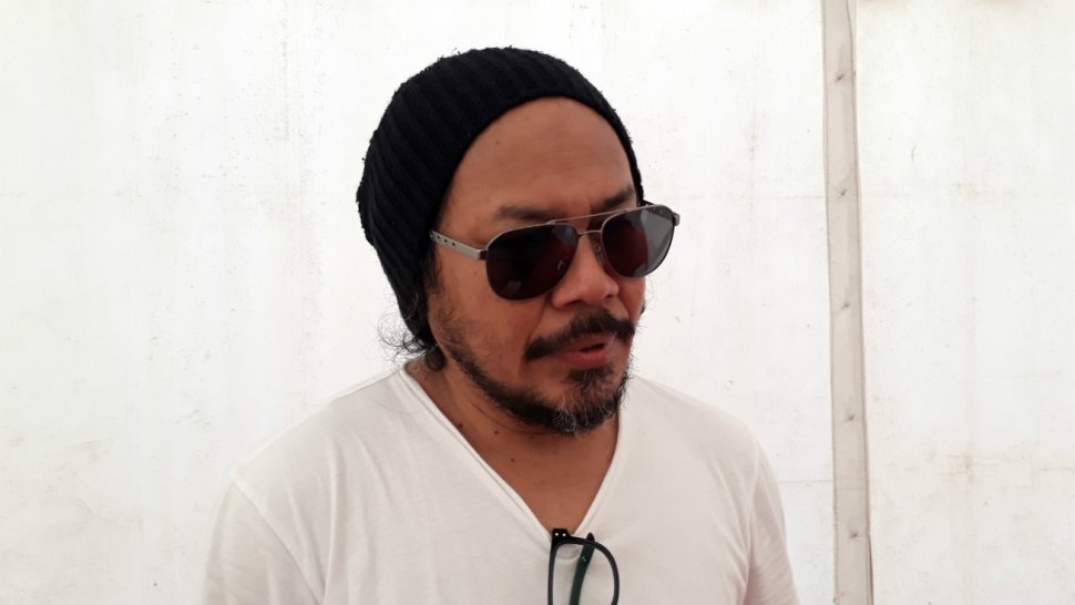 Vokalis band Jamrud, Krisyanto, saat ditemui di kawasan Silang Monas, Jakarta Pusat, Minggu (23/6/2019). [Suara.com/Ismail]