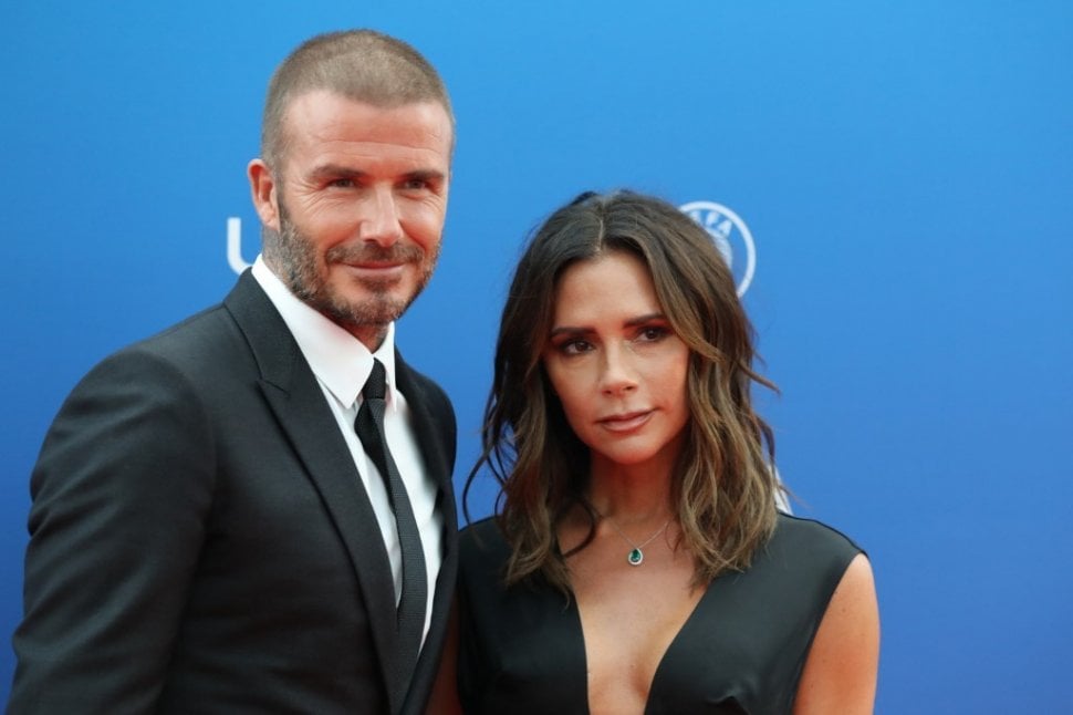 Mantan pesepakbola kesohor dunia, David Beckham, bersama sang istri Victoria Beckham. [AFP/Valery Hache]