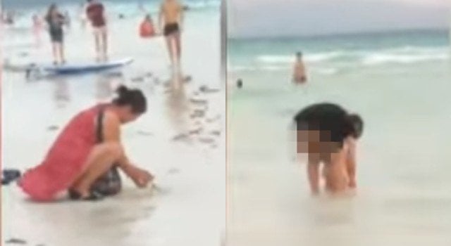 Turis timbun popok bekas di Pantai Boracay. (YouTube)