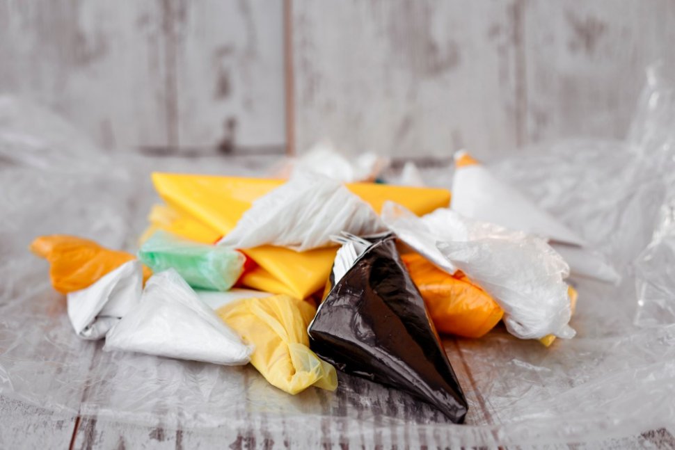 Fold the plastic to reduce the volume of waste.  (Shutterstock)