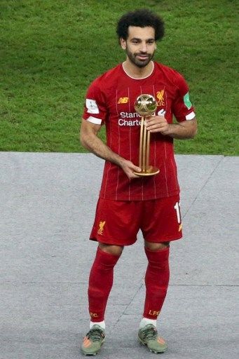 Penyerang Liverpool, Mohamed Salah meraih gelar pemain terbaik Piala Dunia Antarklub 2019. (MUSTAFA ABUMUNES / AFP0