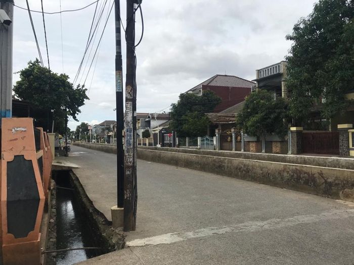 Situ Bunder, Depok, Jawa Barat, yang sekarang sebagian beralih fungsi menjadi perumahan. [Suara.com/Erick Tanjung]