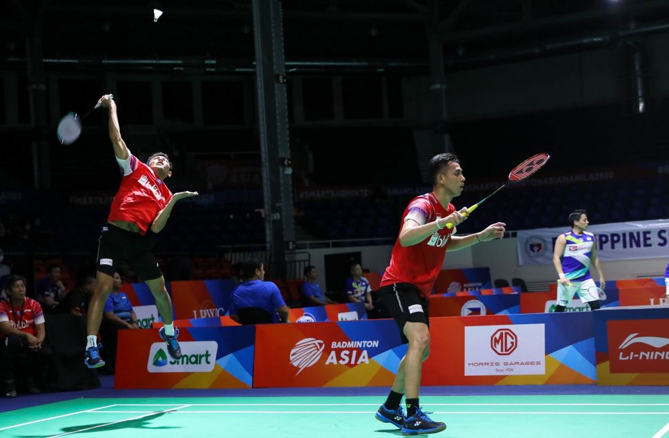 Pasangan ganda putra Fajar Alfian/Muhammad Rian Ardianto menjadi penentu kemenangan tim beregu putra Indonesia atas Korea Selatan dalam babak penyisihan Grup A Badminton Asia Team Championships (BATC) 2020 di Rizal Memorial Coliseum, Manila, Filipina, Rabu (12/2/2020). [Dok. PBSI]