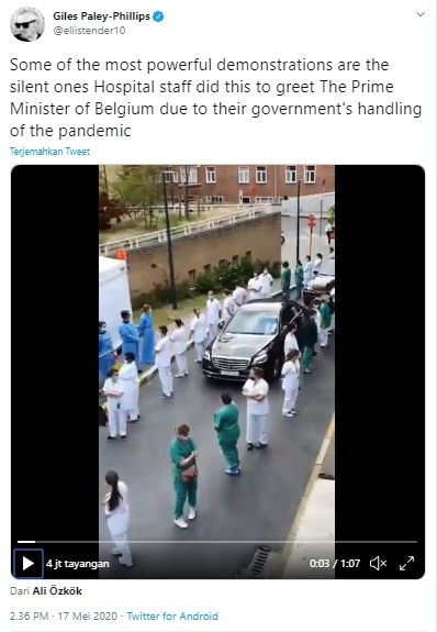 Tenaga medis balik badan saat PM Belgia berkunjung ke RS (Twitter).