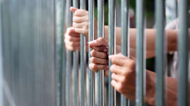 Ilustrasi napi di penjara. [Shutterstock]