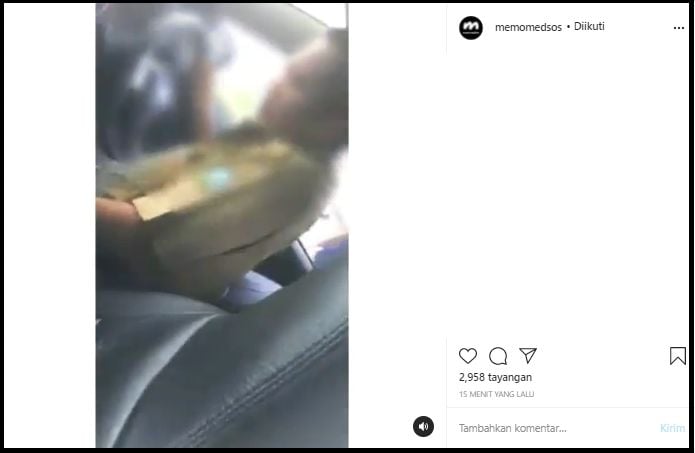 Tangkapan Layar Video Sepasang Oknum Berpakaian Dinas Coklat Ketahuan Indehoi di Dalam Mobil (Instagram/memomedsos).