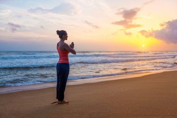 Pose Yoga Surya Namaskar. (Elements Envato)