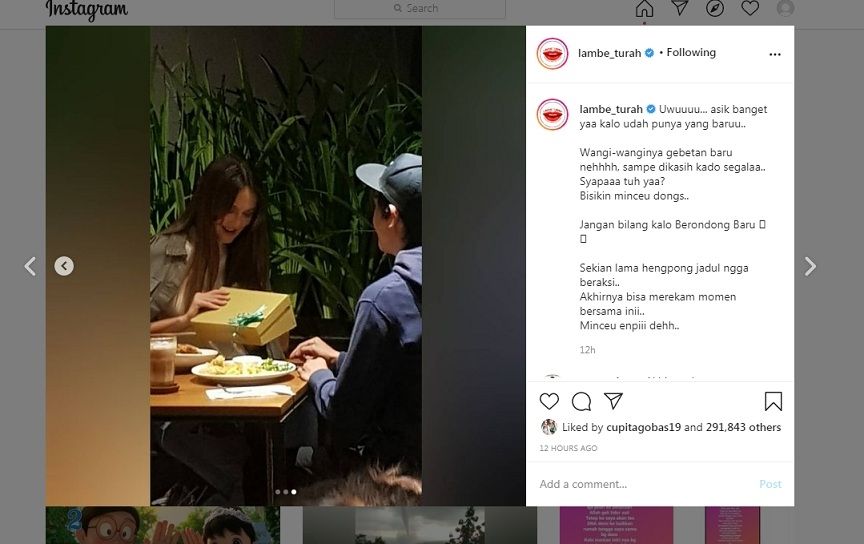 Luna Maya dan seorang lelaki misterius. 