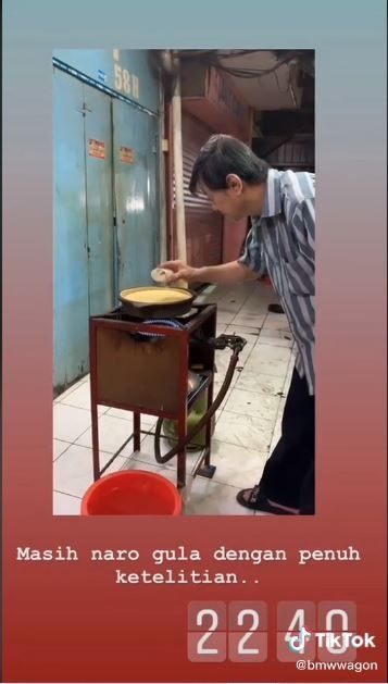 Pedagang martabak yang sangat teliti dan fokus (TikTok @bmwwagon)