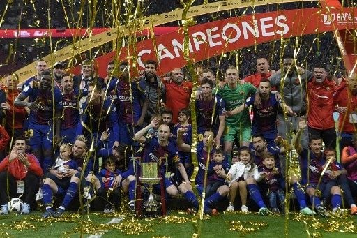 Pemain Barcelona rayakan kemenangan atas Sevilla di partai final Copa del Rey yang berlangsung di Estadio Wanda Metropolitano pada 21 April 2018. [AFP]