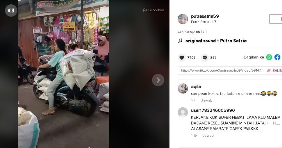 Gadis cantik angkut barang berkarung-karung. (Tiktok/@putrasatria59)