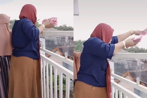 Viral Wanita Buang Uang Dari Balkon. (TikTok/@ayangyasmin)