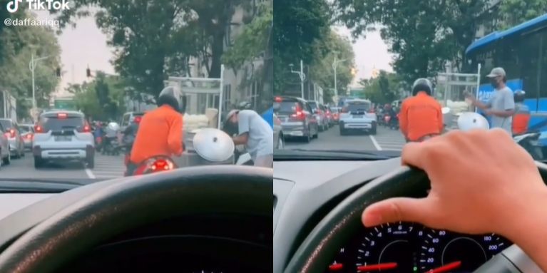 Viral Pemotor Santai Berhenti di Tengah Kemacetan Jalanan, Ternyata Beli Bakpao - Suara.com