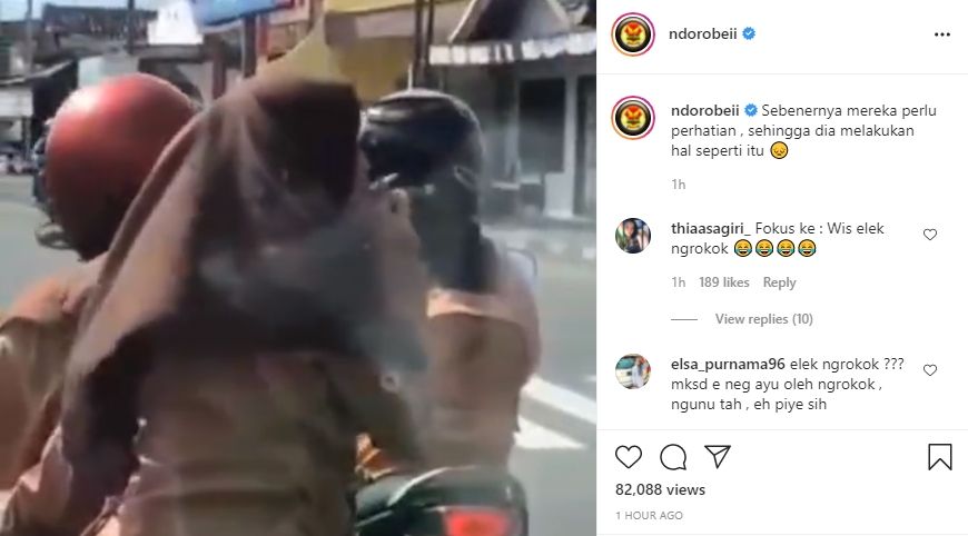 Siswi pakai seragam pramuka kepergok ngerokok di tengah jalan. (Instagram/ndrorobeii)