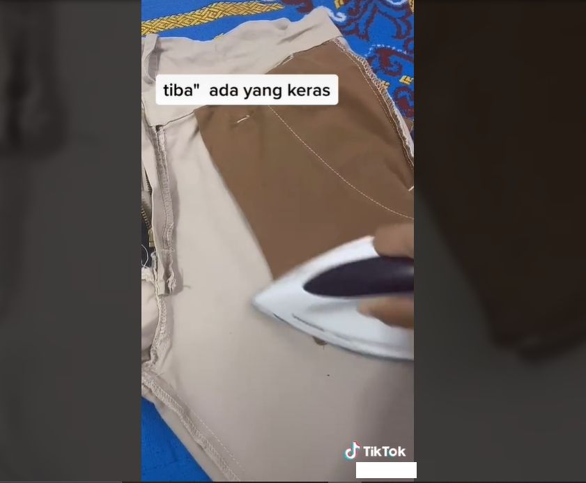 Istri girang setrika celana suami temukan rezeki nomplok (TikTok).