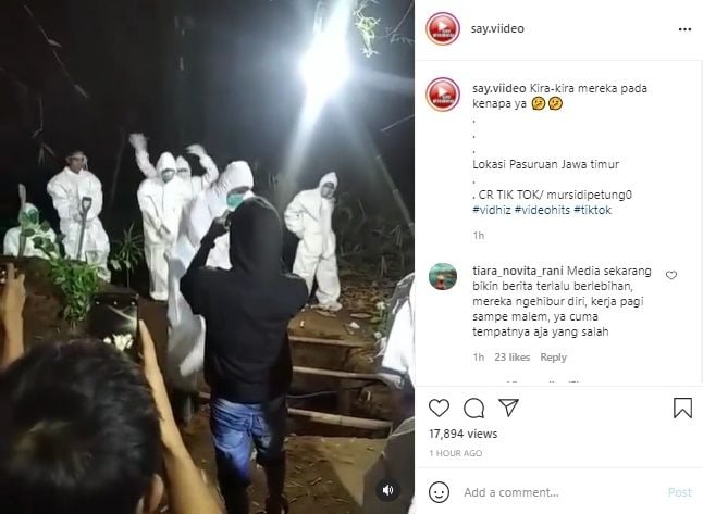 Viral Pengubur Jenazah Covid-19 Pakai APD Joget di Atas Liang Lahat. (Instagram/@say.viideo)