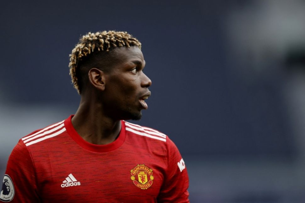 Gelandang sentral Manchester United, Paul Pogba. [ADRIAN DENNIS / POOL / AFP]