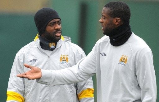 Yaya Toure dan Kolo Toure. (ANDREW YATES / AFP)