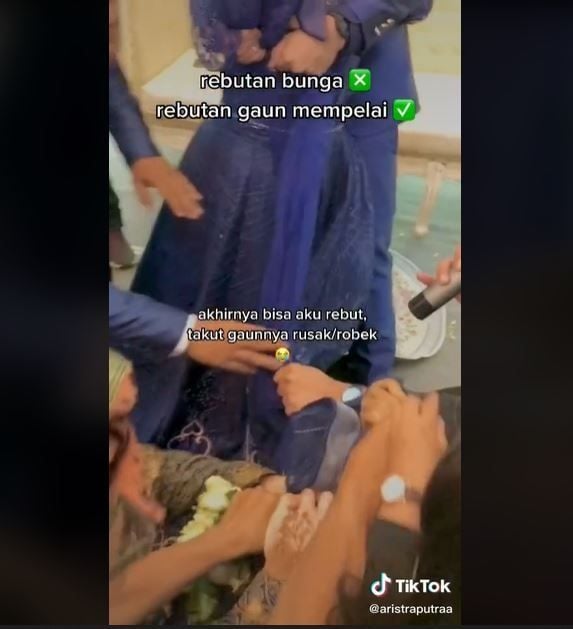 Lempar Buket Bunga Berakhir Ricuh, Tamu Rebutan Gaun Pengantin Wanita (tiktok.com/@aristraputraa)