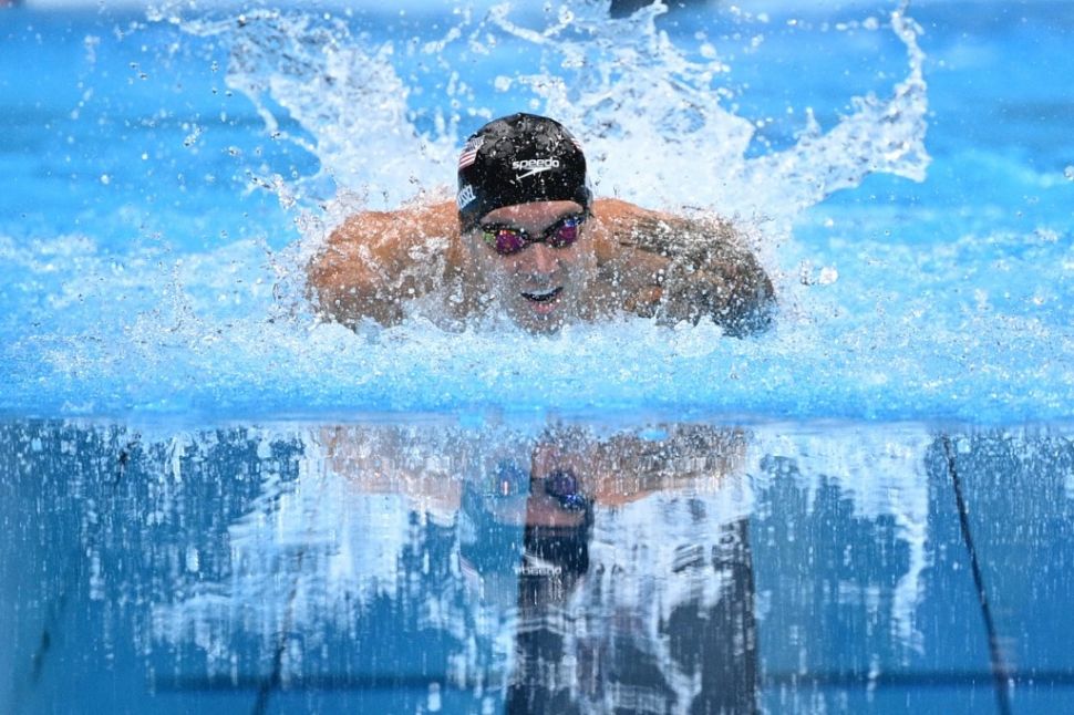 Perenang Amerika Serikat, Caeleb Dressel tampil di Olimpiade Tokyo. [Oli SCARFF / AFP]