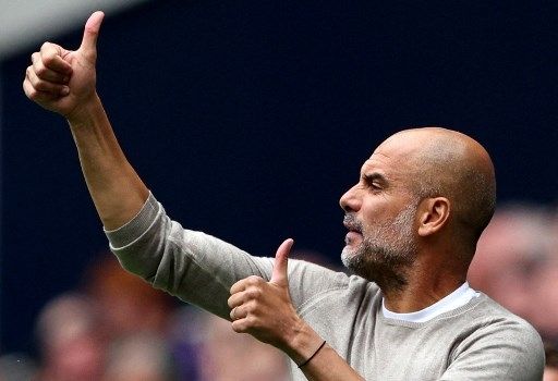 Manajer Manchester City Pep Guardiola saat skuatnya menghadapi Tottenham Hotspur di pertandingan Liga Inggris di Tottenham Hotspur Stadium, London, 15 Augustus 2021. Adrian DENNIS / AFP