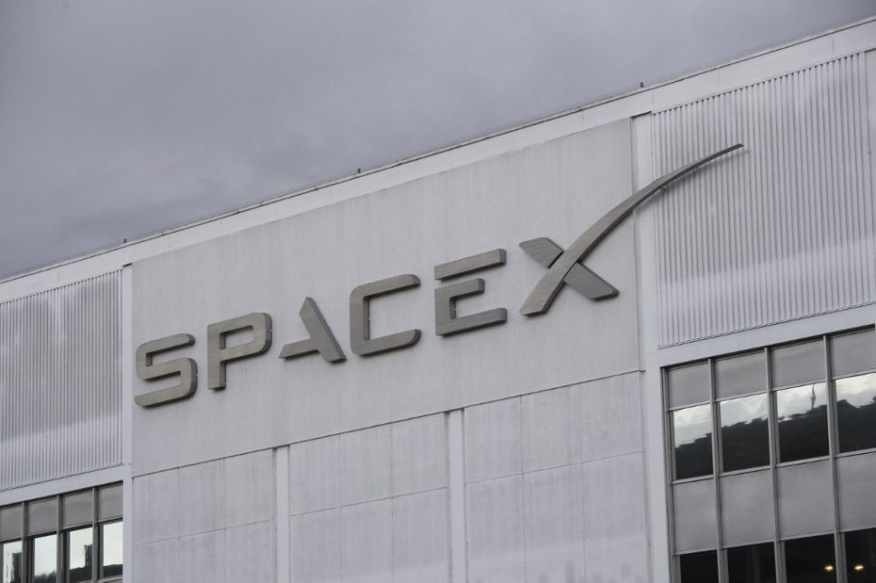Logo SpaceX. [Patrick T. Fallon/AFP]