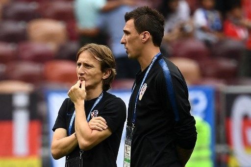 Mario Mandzukic dan Luka Modric di Timnas Kroasia. (FRANCK FIFE / AFP)