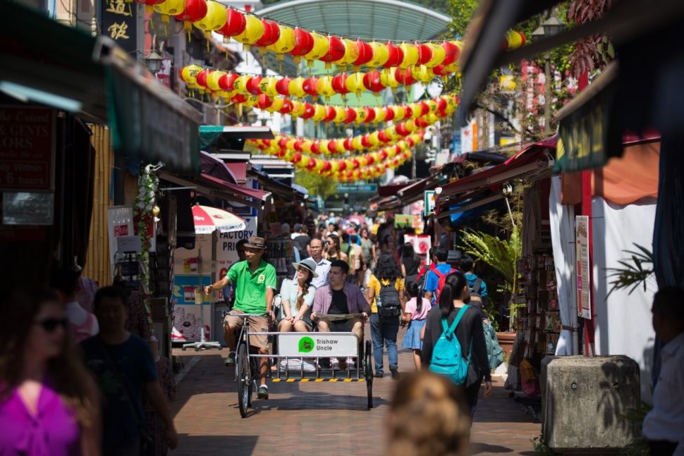 Tur naik becak di Chinatown Singapura. (Dok. STB)