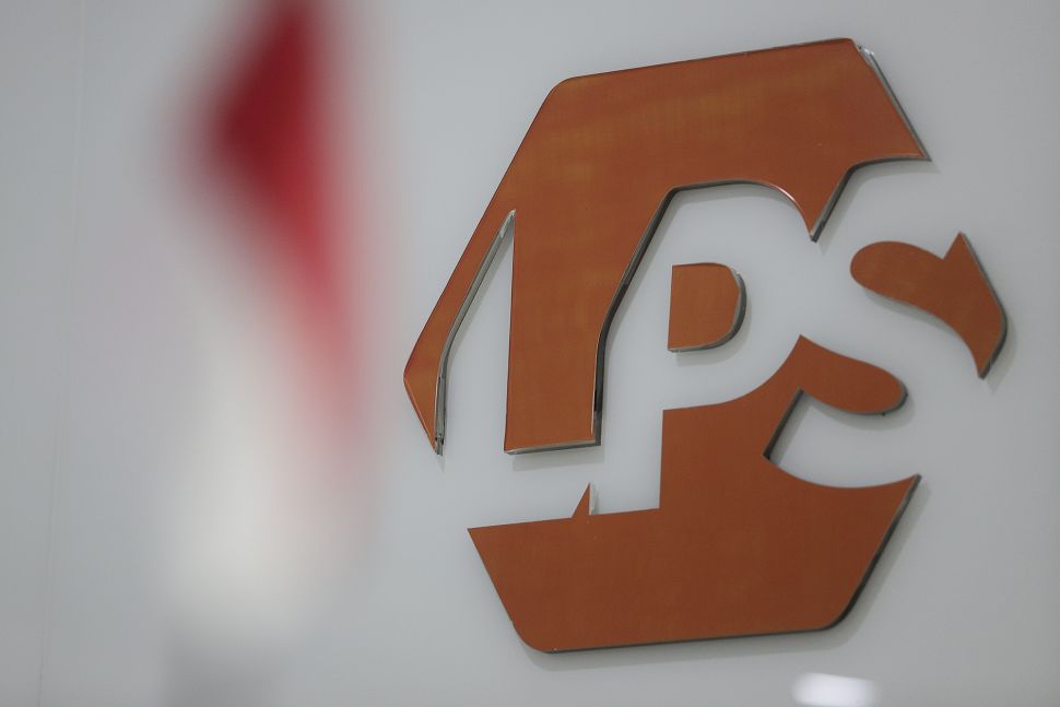 Logo Lembaga Penjamin Simpanan (LPS) di Kantor LPS, Gedung Pacific Century Place, SCBD, Jakarta, [Suara.com/Angga Budhiyanto]