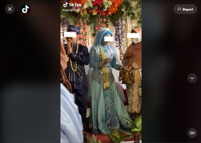 Viral baju pengantin pasangan ini bikin gagal paham. (TikTok/@lannnnn_03)