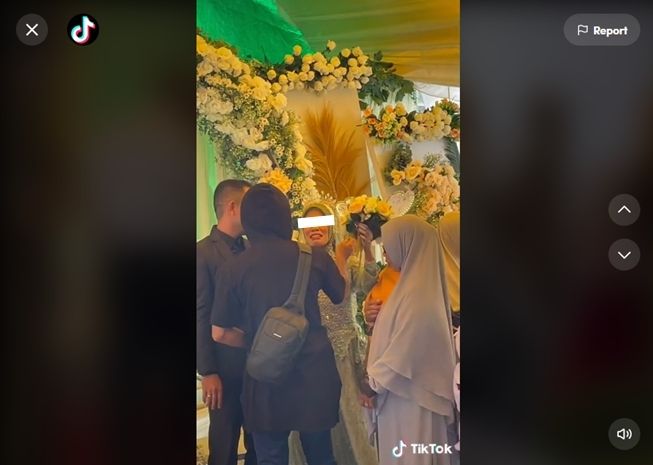 Viral kedatangan tamu tak terduga, pengantin wanita menangis di pelaminan. (TikTok/@doraemoni0204)