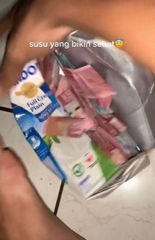 Kemasan susu jadi celengan. (Tiktok)