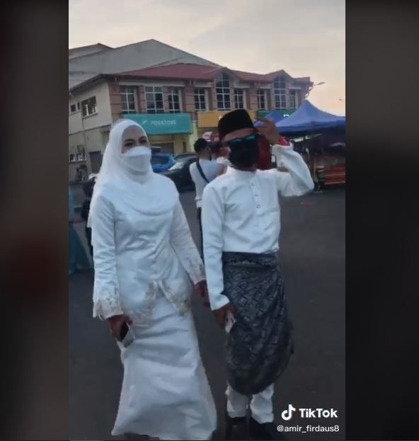 Viral Pengantin ke Pasar Malam setelah Menikah (tiktok.com/@amir_firdaus8)