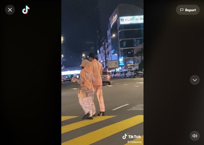 Viral video pria pakai high heels di tempat umum. (TikTok/@11yayang)