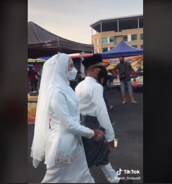 Viral Pengantin ke Pasar Malam setelah Menikah (tiktok.com/@amir_firdaus8)