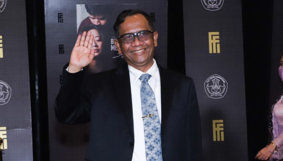 Menteri Koordinator Bidang Politik, Hukum dan Keamanan (Menkopolhukam) Mahfud MD saat menghadiri gelaran Festival Film Indonesia di JCC Senayan, Jakarta Pusat, Rabu (10/11/2021). [Suara.com/Alfian Winanto]