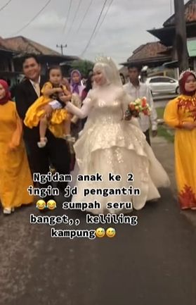 Wanita hamil ngidam jadi pengantin. (Tiktok/@singamanja_slebeww)