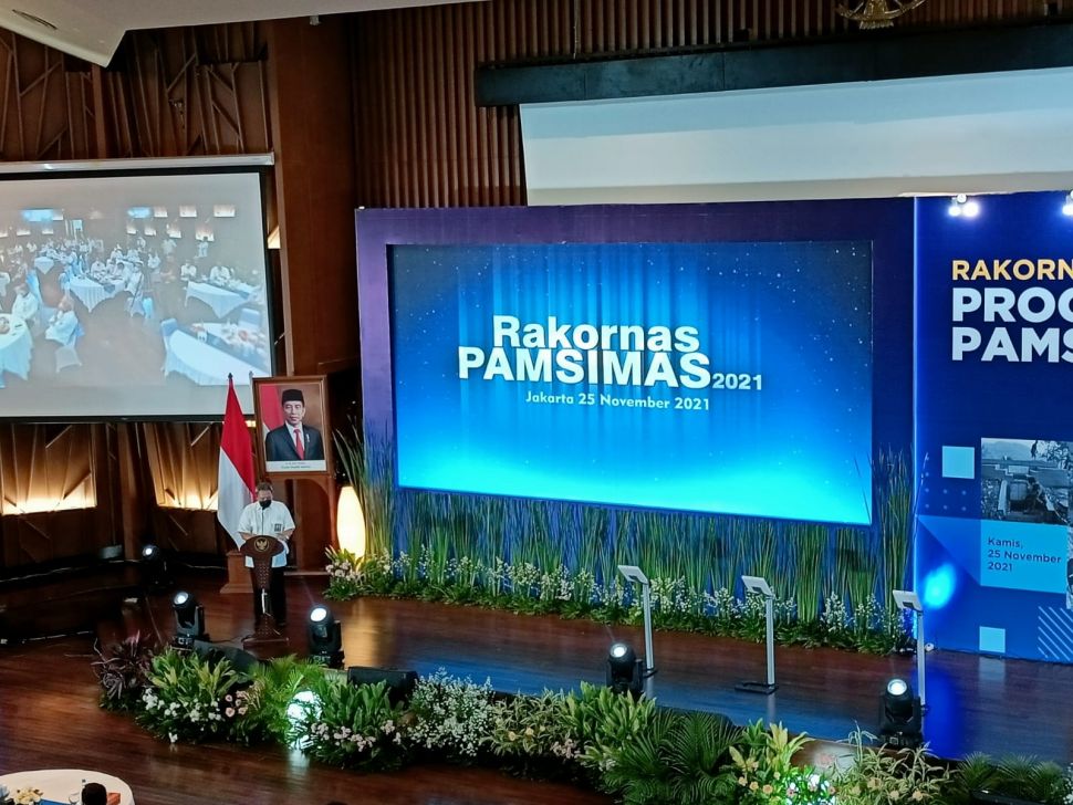 Direktur Air Minum, Anang Muchlis saat memberikan sambutan dalam Rakornas Program Pamsimas III 2021 di Auditorium Kementerian PUPR. (Restu Fadilah/Suara.com)