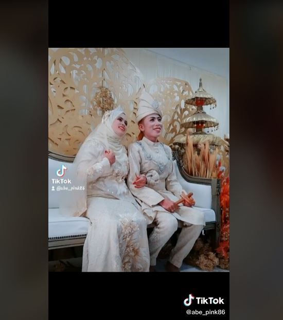 Foto Pernikahan, Pria Ini Dikritik karena Punya Rambut Panjang dan Pakai Makeup (tiktok.com/abe_pink86)