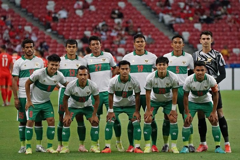 Para pemain Timnas Indonesia berpose sebelum bertanding melawan Timnas Singapura dalam pertandingan semifinal Piala AFF 2020 di National Stadium Singapura, Rabu (22/12/2021) malam WIB. [ANTARA FOTO/Humas PSSI]