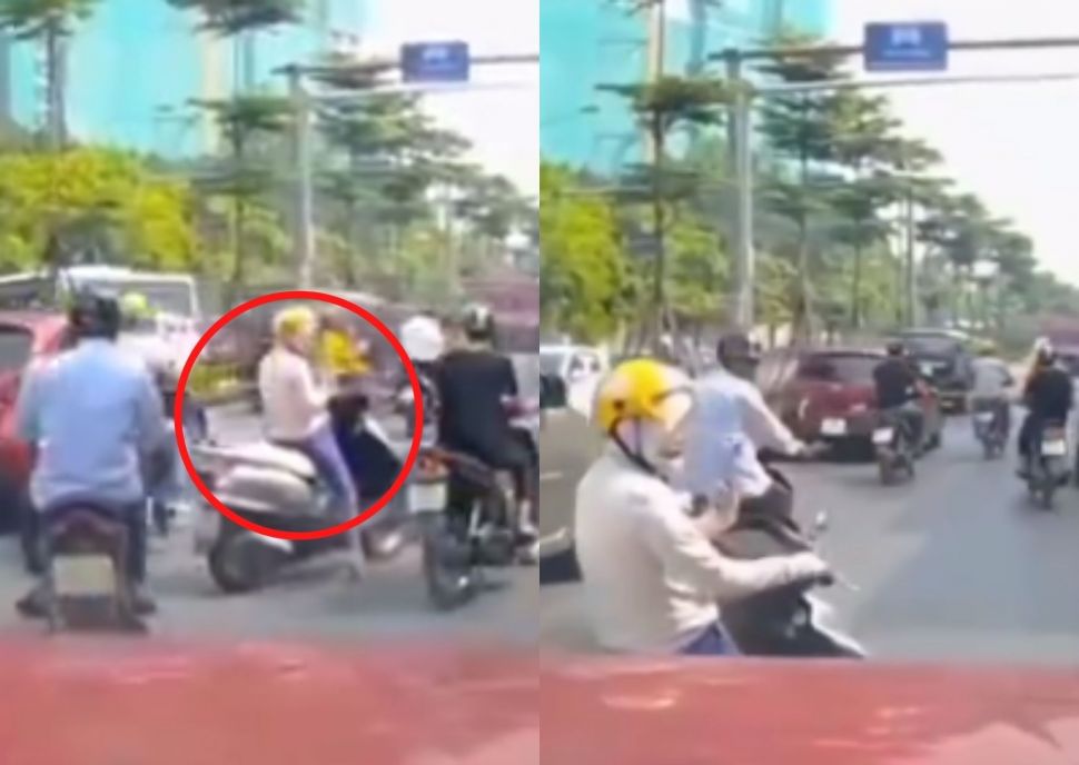 Duh Bikin Macet! Emak-emak Santai Teleponan Naik Motor Berhenti di Tengah Jalan. (Instagram/makassar_iinfo)