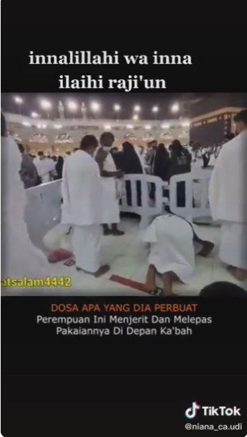 Tangkapan layar video perempuan menjerit dan melepas pakaiannya di depan Ka'bah. [TikTok/@niana_ca.udi]